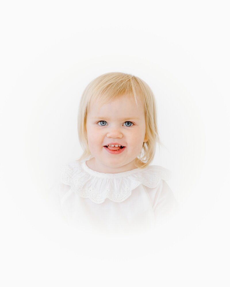 Elegant baby portrait with bonnet and neutral backdrop – children’s heirloom session OKC