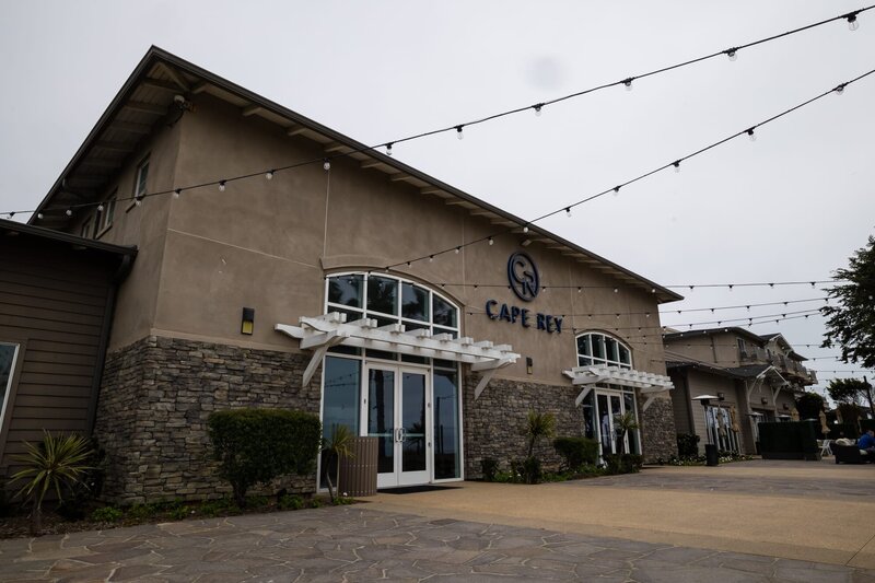 Outdoor terrace and building at Cape Rey Carlsbad Beach wedding venue.