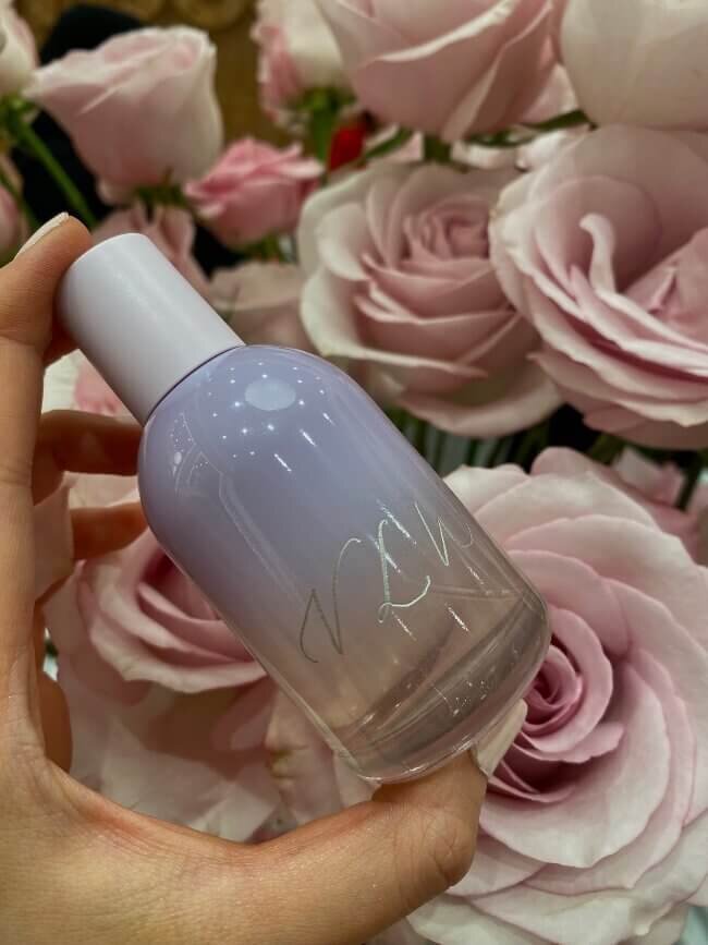 purple bottle with silver calligraphy engraving 