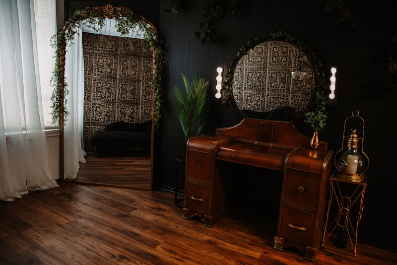 large mirror, window, and antique vanity