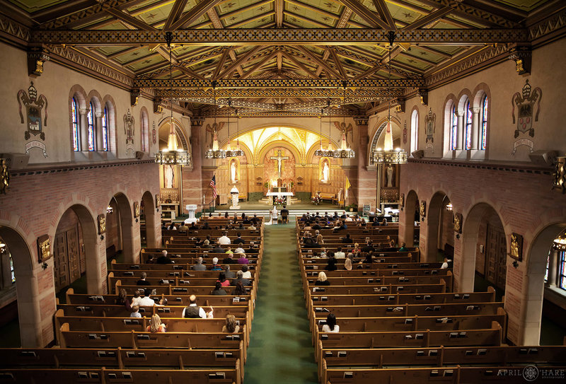 Inside-of-Saint-Catherine-of-Siena-Catholic-Church-During-Wedding-Ceremony-in-Denver CO