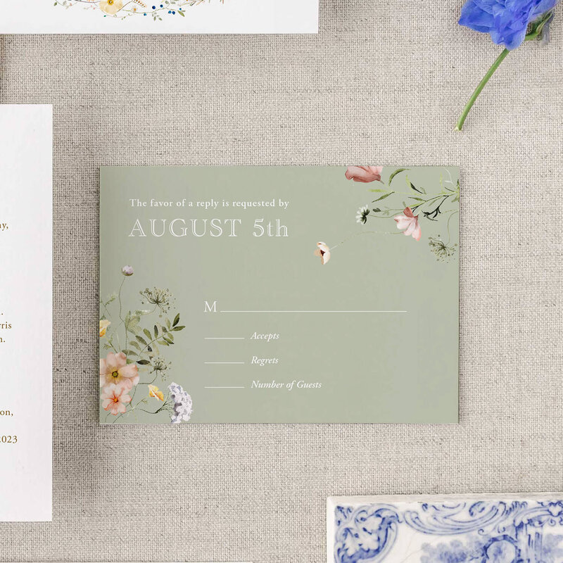 light green wedding invitation envelope with floral accents