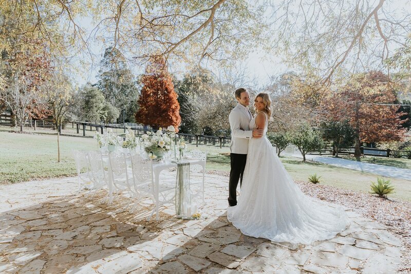 Luxurious looking country Elopement in NSW, Australia witha young couple and a beautiful outdoor table setting
