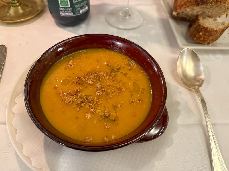 A pumpkin, spelt, and amaretti soup at Buca Di Sant'Antonio in Lucca, Italy