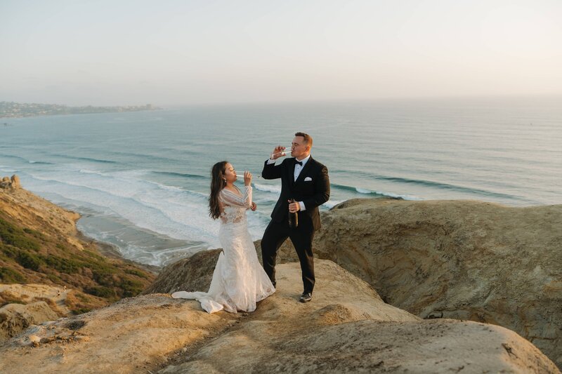 bride and groom on san diego sand cliffs
