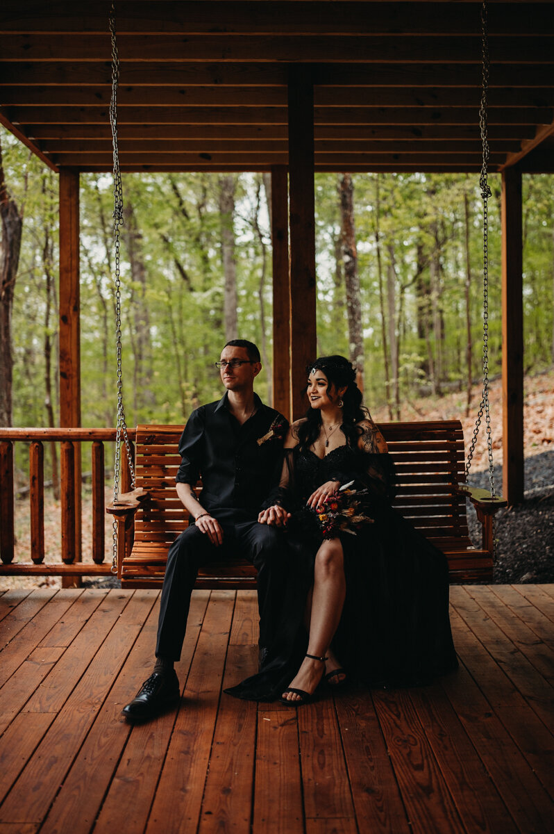 Couple relax on bench at Hocking Hills Cabin
