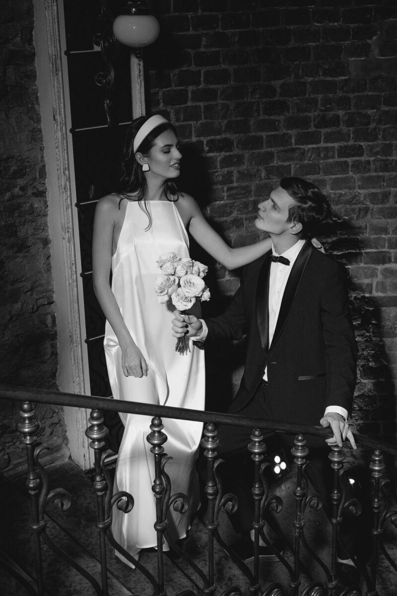 Bride and groom walk up memorial steps at their DC wedding