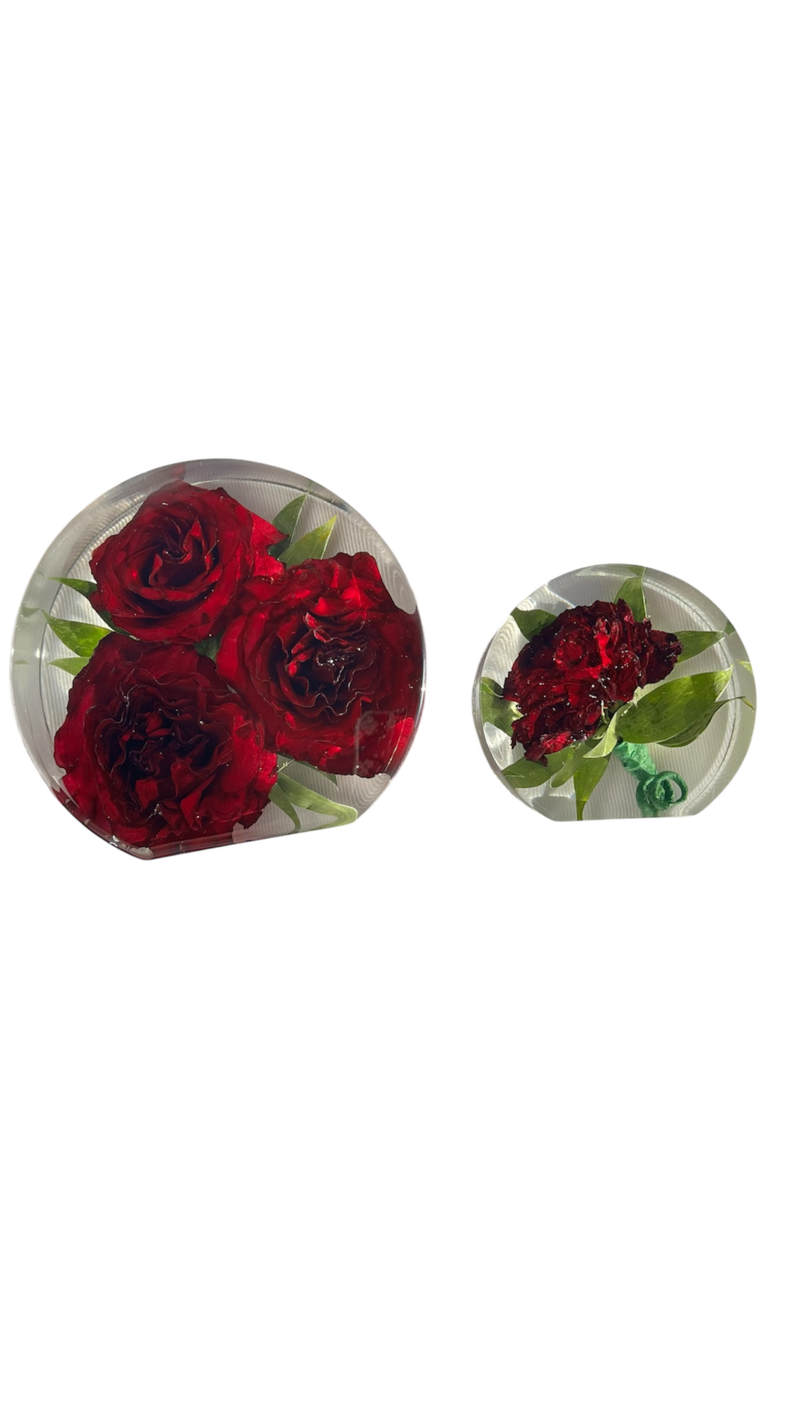 white and blue bouquet preserved in a hexagon shaped resin block