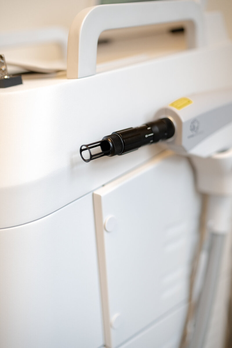 Laser hair removal in Charleston performed by a professional aesthetician, targeting leg hair removal for smooth, hair-free skin.
