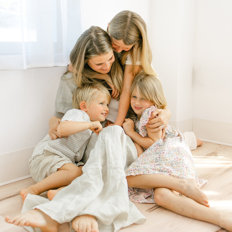 Professional Beach family portrait, taken  by Emily DeLuke Photography in Surf City NC