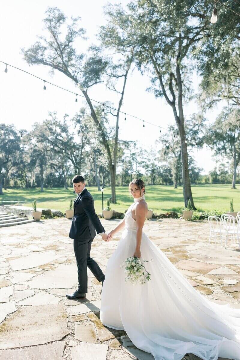 Styled Couple and Bouquet | Helena Elizabeth Events, South florida wedding planners