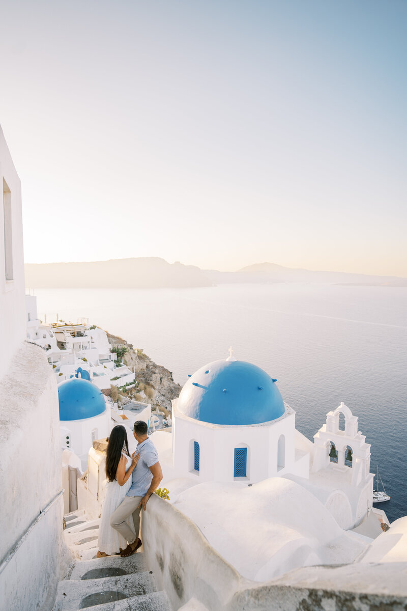 Couple posing on staircase at destination wedding