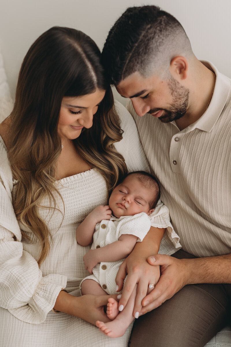Family of 5 for a newborn shoot. Family with 2 boys and 1 girl.newborn session