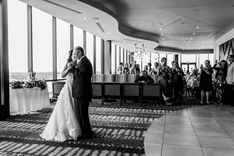 Black and White photo of father daughter dance at Disney wedding