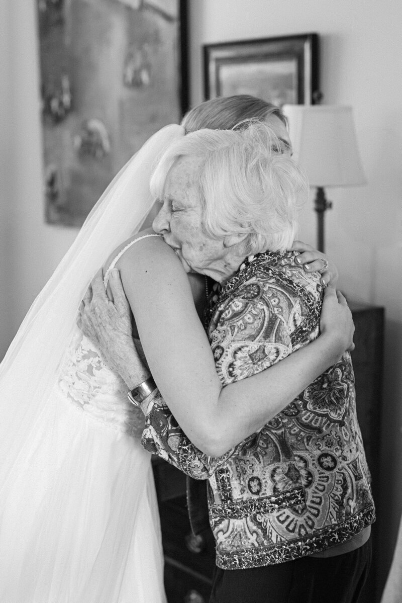 Bride hugging grandma at wedding taken by wedding photographer frederick md, Nicole Simensky