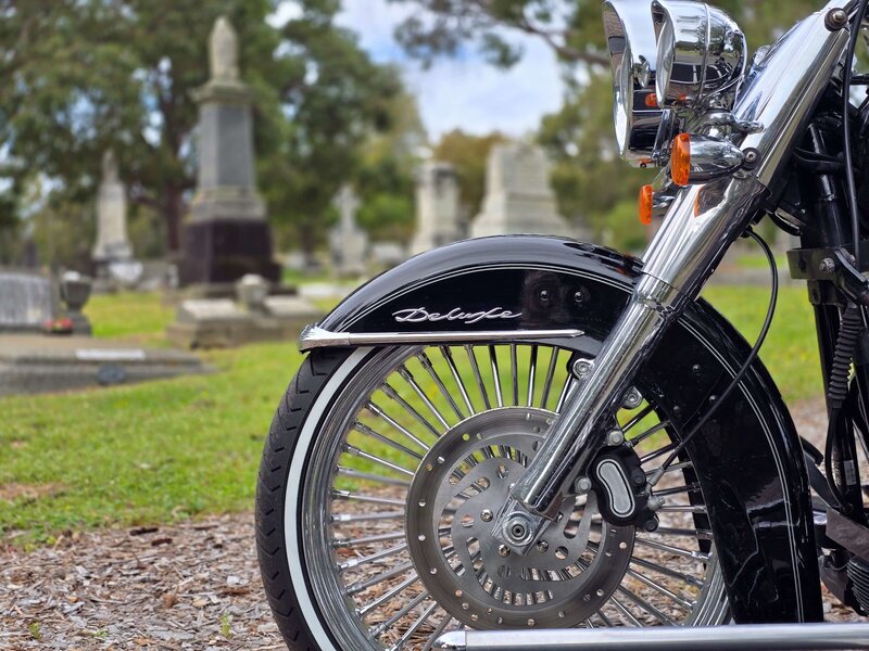 Close-up of Harley Davidson motorcycle hearse tyre, part of a distinctive funeral fleet in Perth.