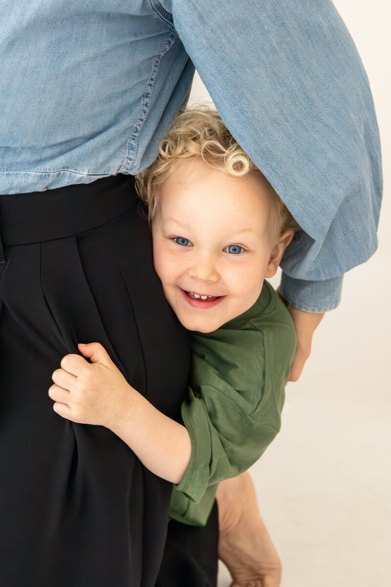 Close-up of parent and child connection during professional family photography session