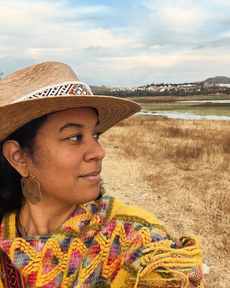 V Faemana, animist herbalist, ritualist, rose healer, Oracle, and tabaquera in San Miguel De Allende, offering sacred plant spirit medicine, tobacco readings, chants, and ceremonial healing through EnForma.