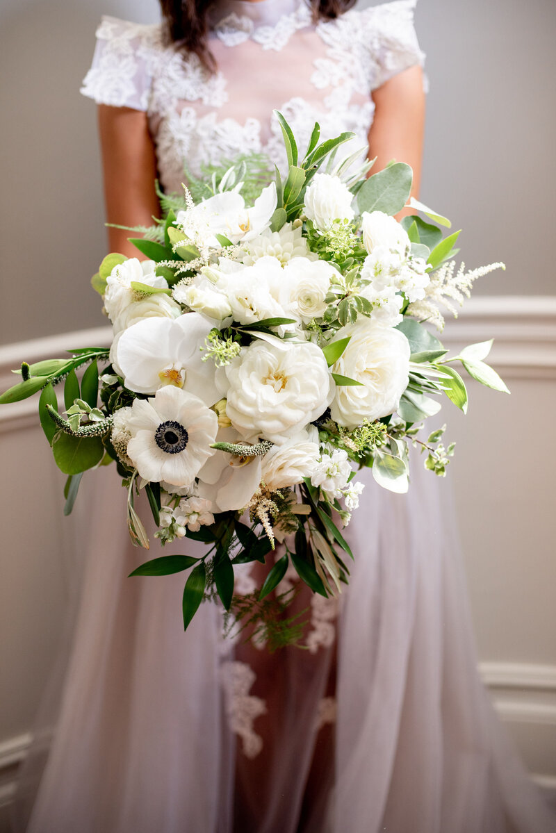 Bride with large white bouquet