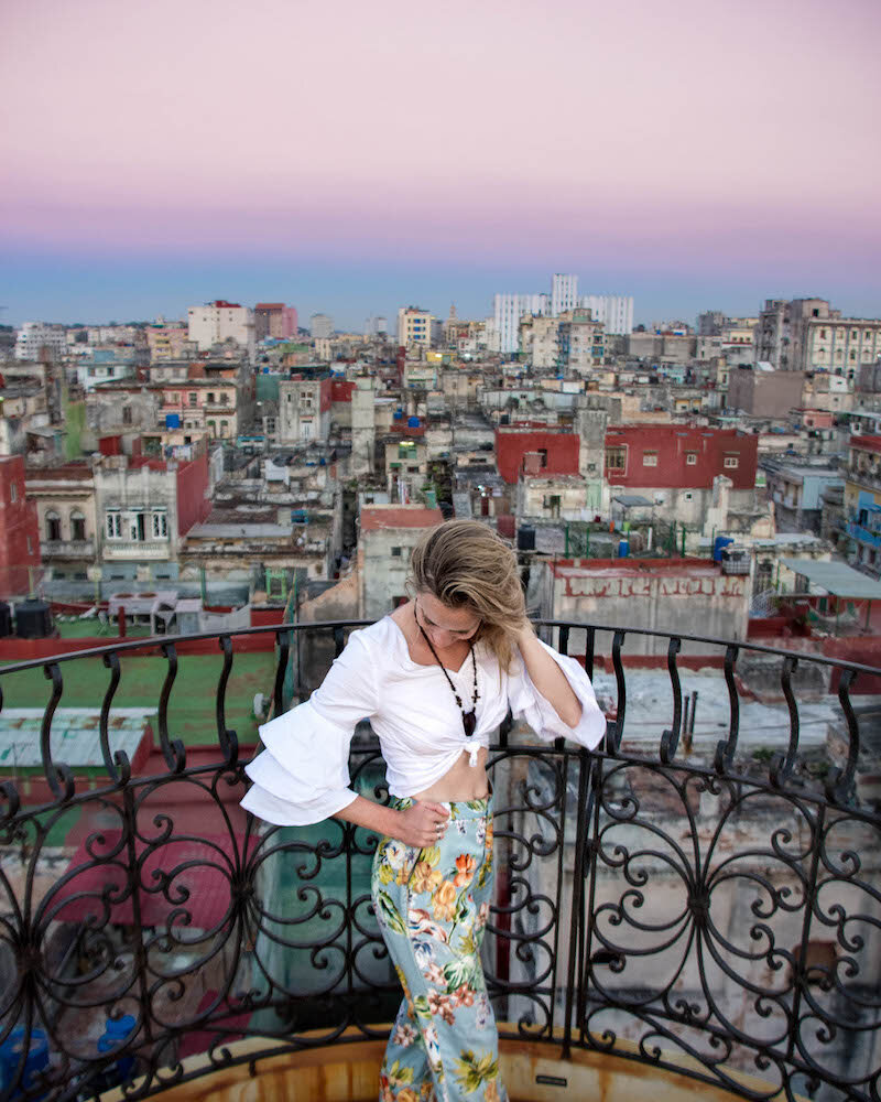 Female traveler hangs out on the rooftops of Havana, Cuba