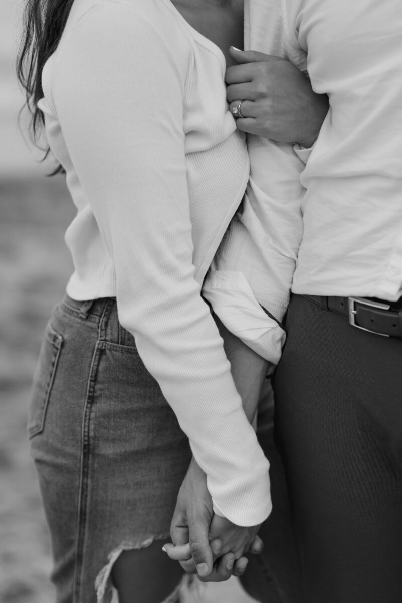 Engaged Couple Holding Hands