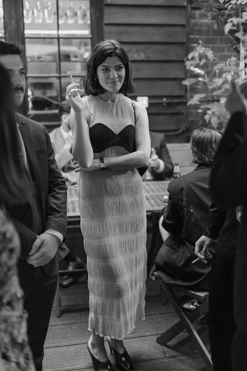 Wedding photographer captures couple taking a stroll hand in hand at their french chateau wedding.