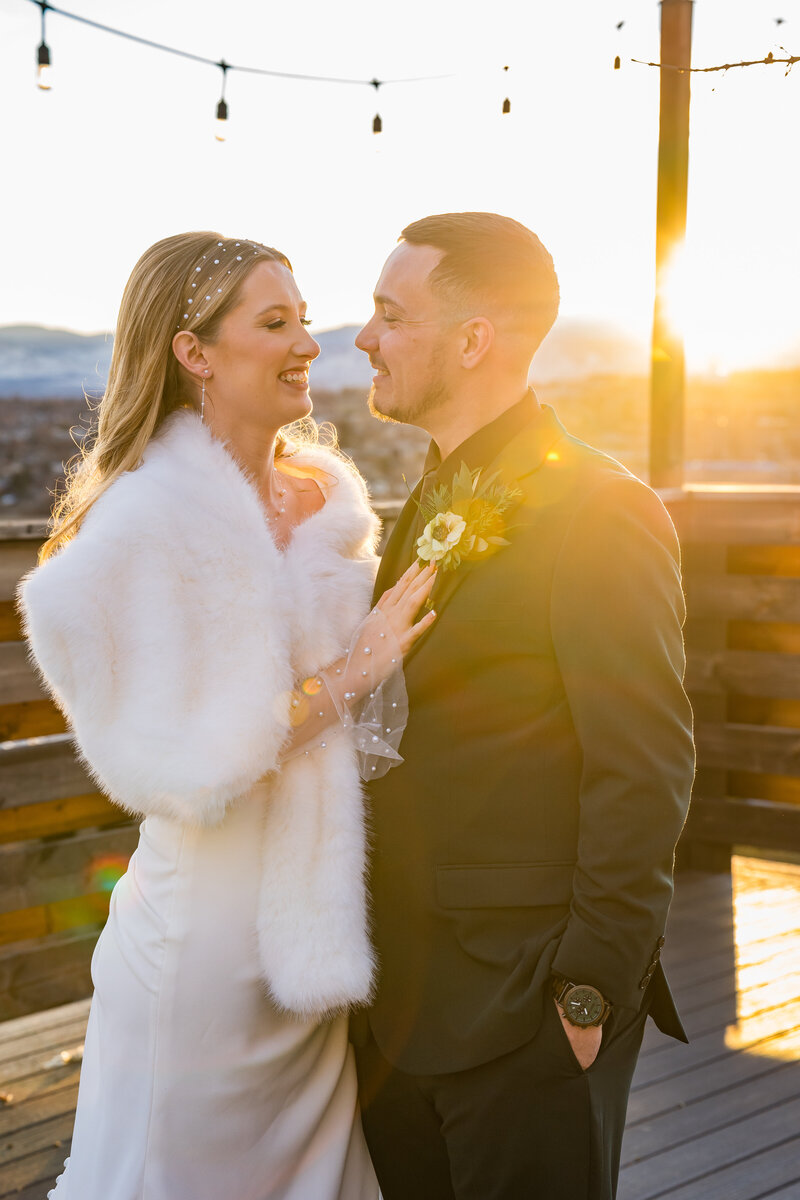 Golden hour winter wedding at Brittany Hill with glowing skies and cozy couple’s portraits, captured by Colorado micro-wedding photographer