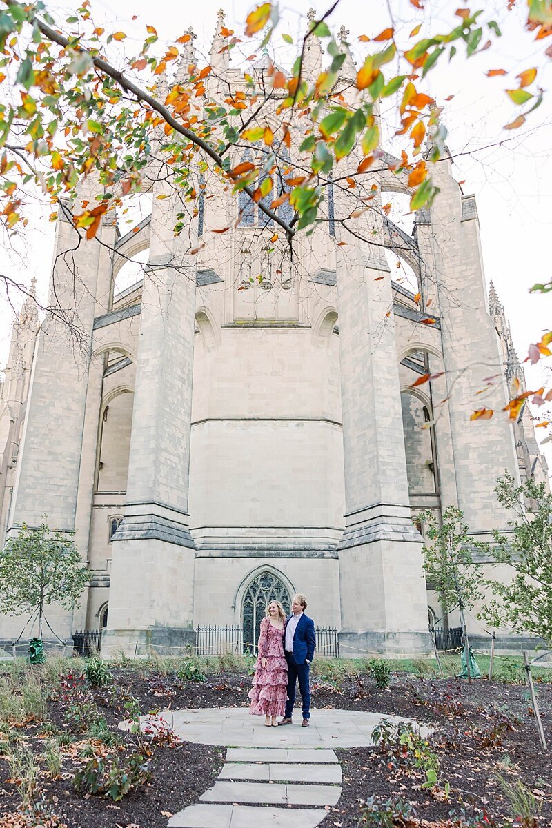 engagement-session-at-national-cathedral-romantic-portrait-couple-walking-on-national-cathedral-grounds