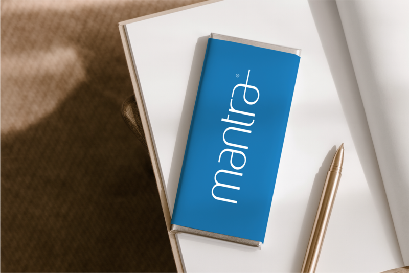 Personalised minimalist chocolate bar for Driftwood Social at Vibe Hotel, part of TFE Hotels. Designed by Barilliant for premium guest gifting and events, featuring sleek black packaging and contemporary luxury styling.