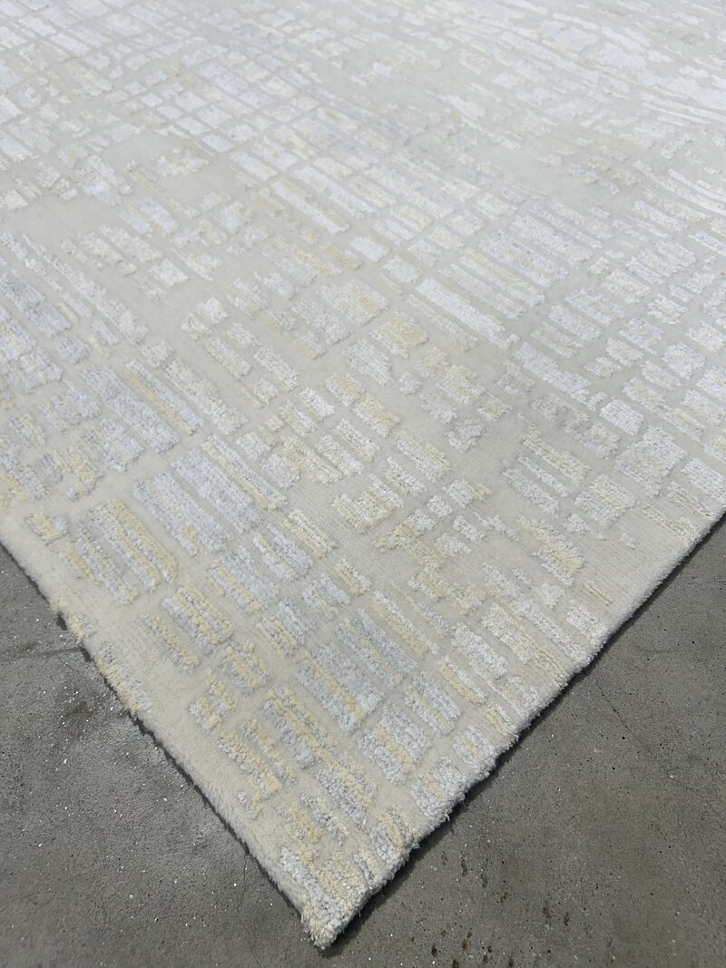 Dash Rug Custom white and gold rug corner