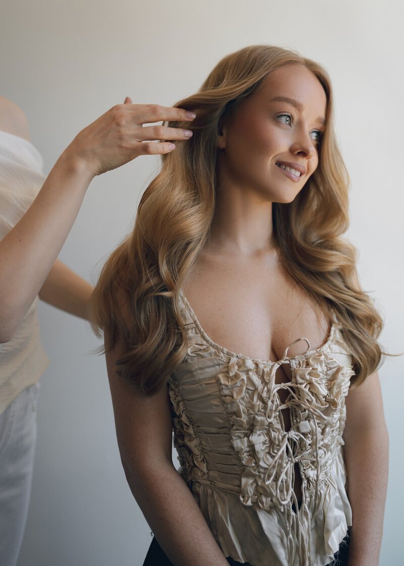 Editorial-inspired bridal beauty portrait with luminous skin and neutral glam makeup by Yana in Napa.