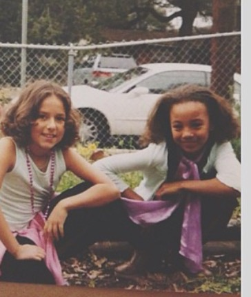 kids posing at a garden
