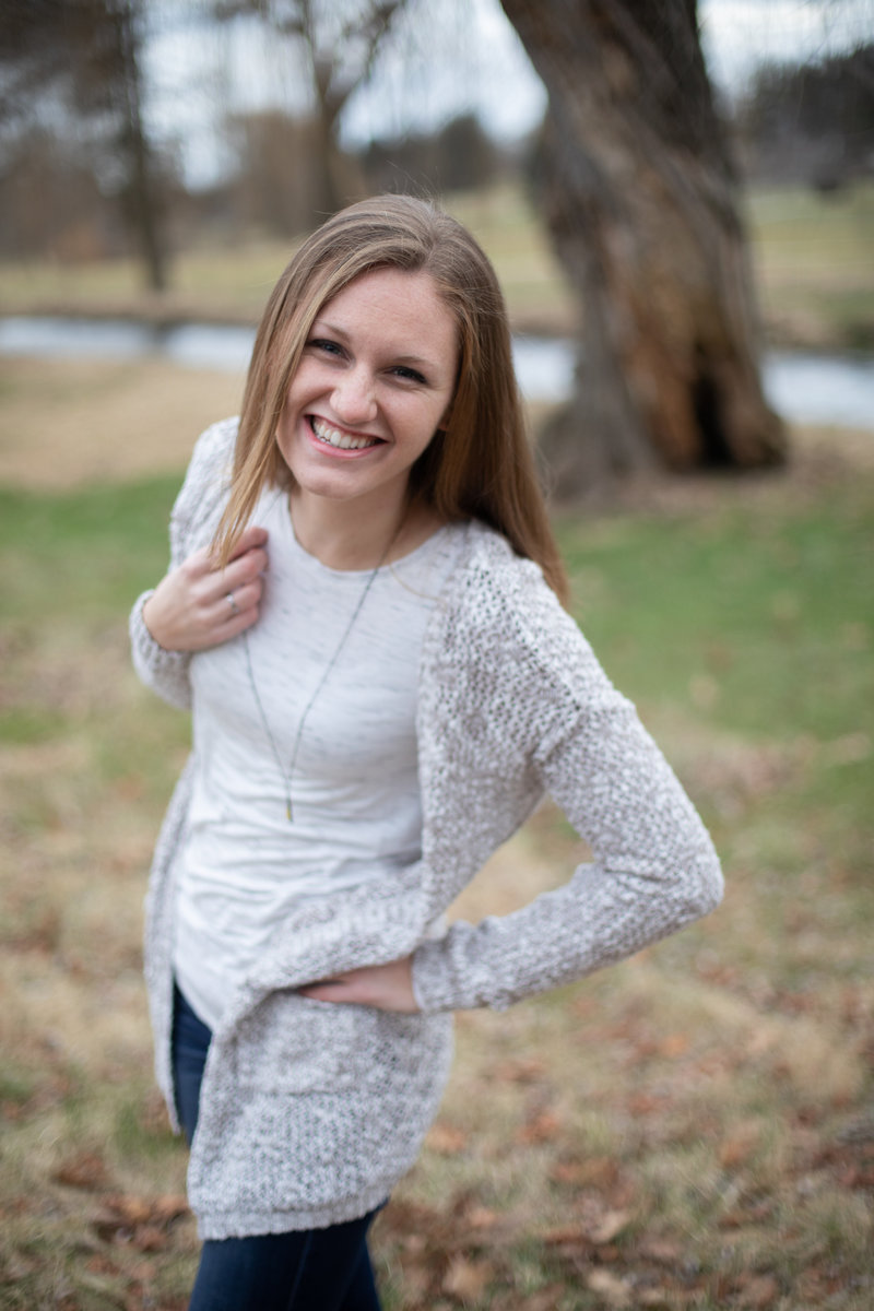 Headshot of Liz outside smiling towards the camera