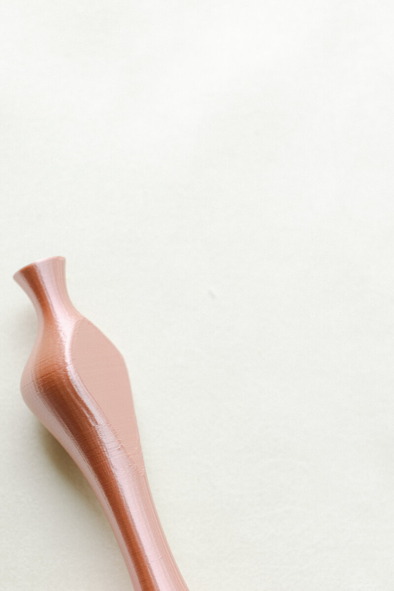 Miniature vases used as props in flat lay floral arrangements