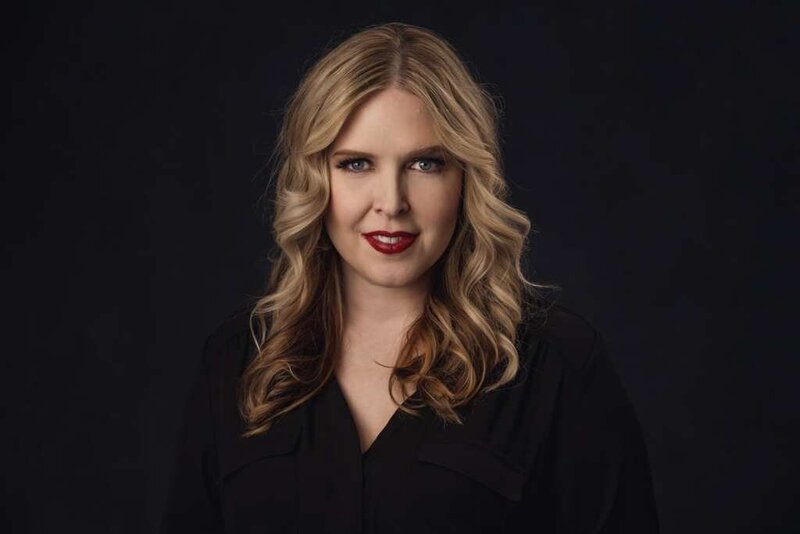 Headshot of Whitney Stillwell, the CEO and lead photographer of Macaron Mouse