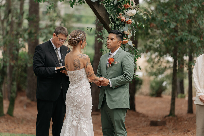 Bride and Groom during the ceremony at Pineland Place in Charleston SC