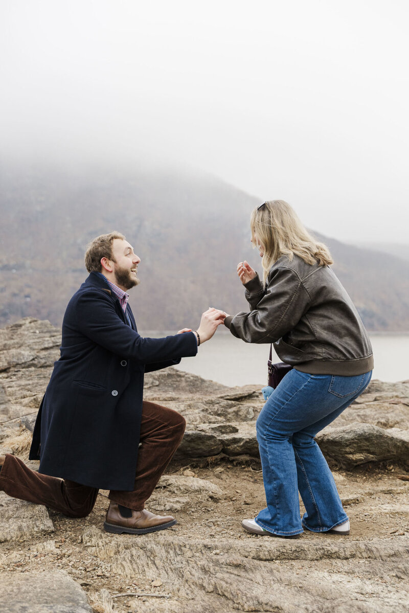 She says yes as he slips on the ring during a surprise Hudson Valley proposal