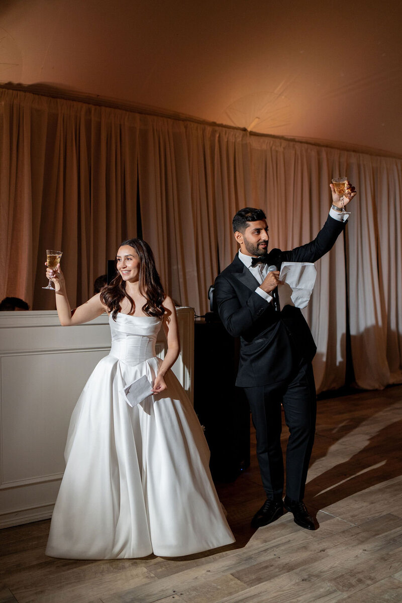 Bride and groom seeing reception set up and smiling taken by chicago film wedding photographer Allison Francois