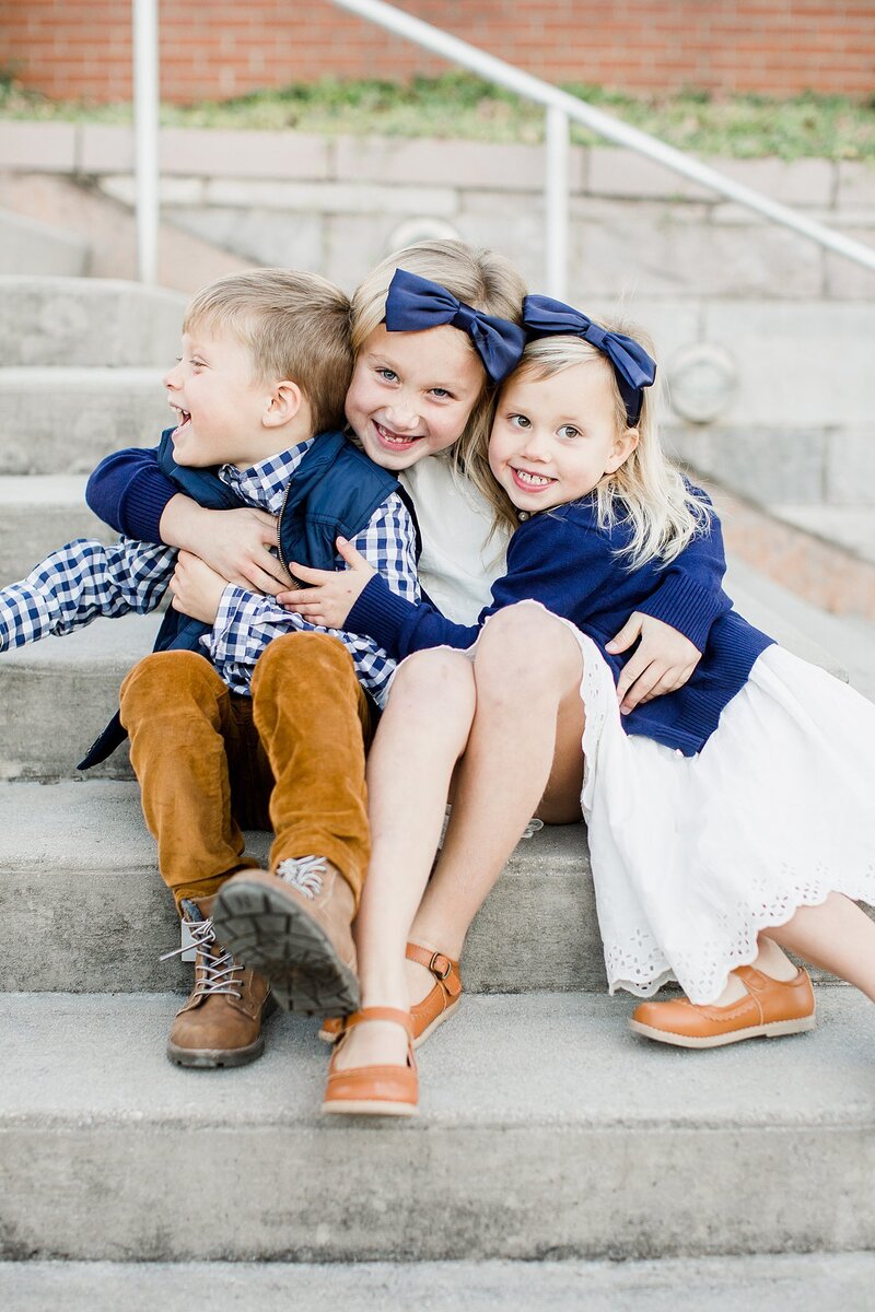 siblings on stairs by knoxville wedding photographer, amanda may photos