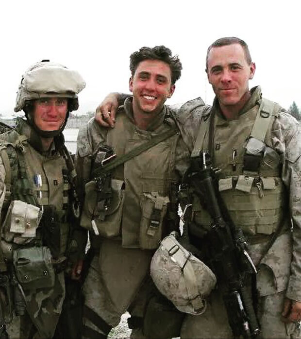 An older military photo of the Rising Ridge founder with other military men.