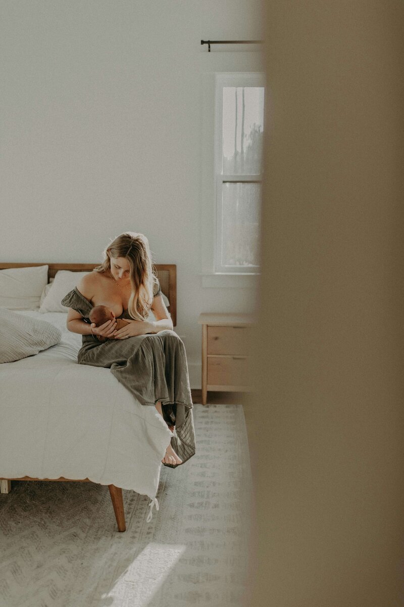 mother breastfeeding infant