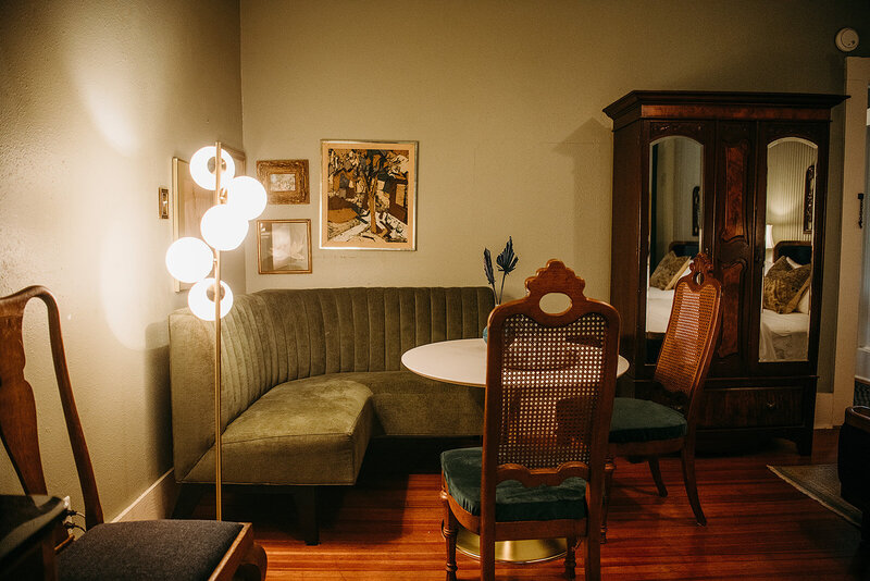 Corner banquet seating  provides a landing pad for drinks and snacks before heading downtown