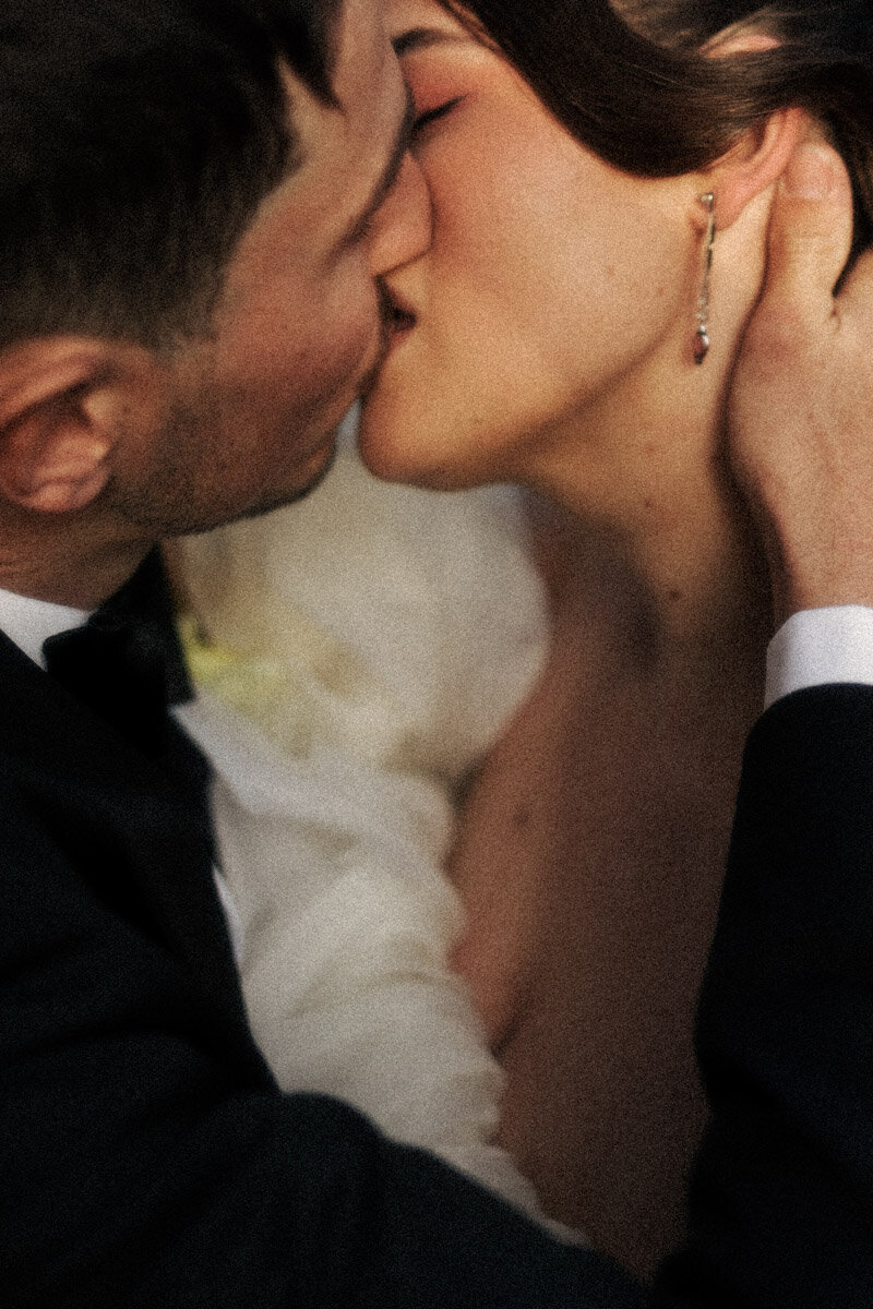 A couple celebrating their wedding on a boat at a Rotorua Lake in the Bay of Plenty