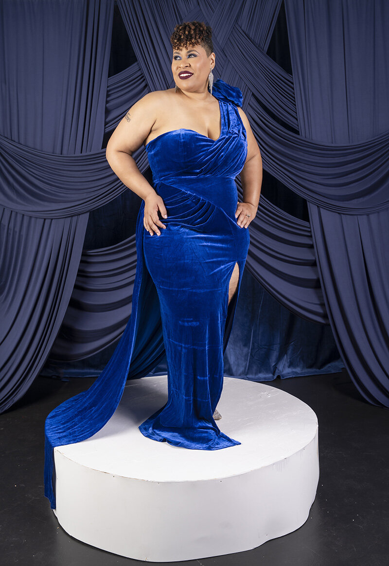 LaTonya poses for the camera in her photography studio