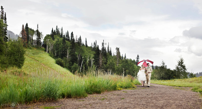 Rainy wedding day portrait on the trails at Steamboat Springs Resort