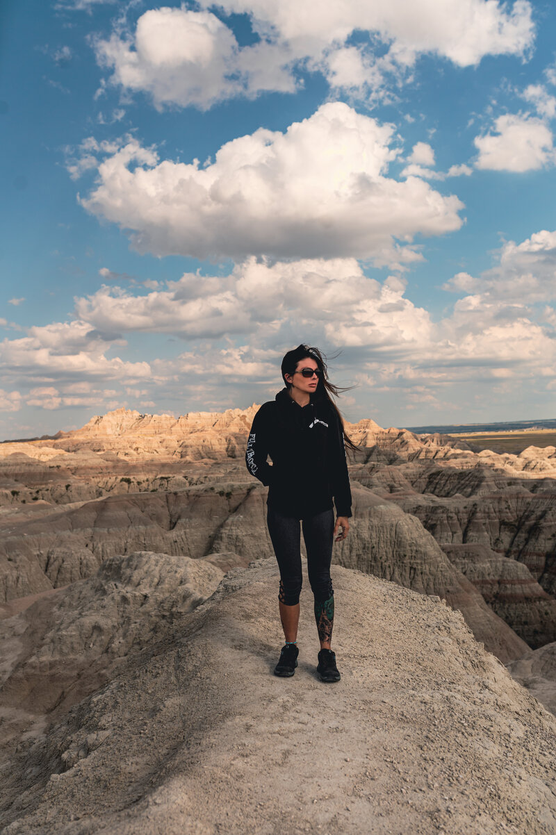 Ashley bird standing at badlands National park