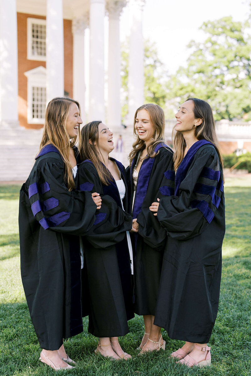 College senior friends laughing together
