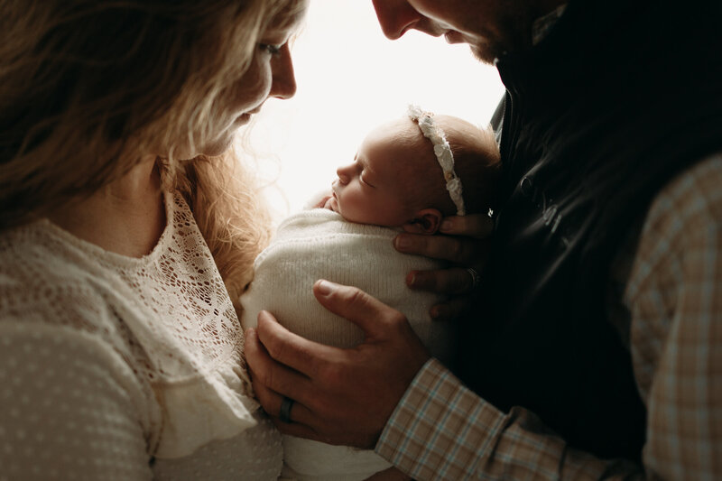 mom and dad with new baby