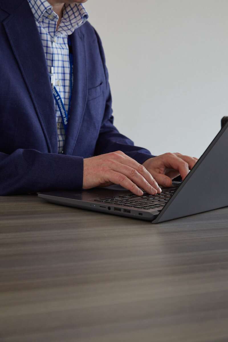 Image of Dr Matt Williams and his laptop