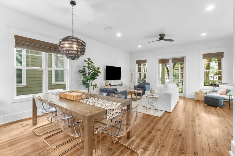 Stylish open-concept living and dining space with modern accents at Tangerine Dream in Carillon Beach near Santa Rosa Beach.
